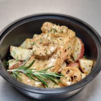 Salmon New Orleans w/ Roasted Potatoes  · Seared Salmon & Shrimp topped with a Cajun Cream Sauce