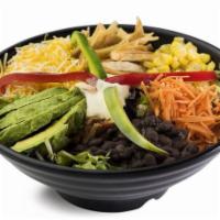 The International Salad · Our charcoal chicken, black beans, guacamole, corn kernels, tomatoes, red onions, green/red ...