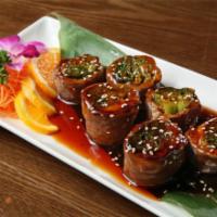 Beef Negimaki · Beef wrapped with scallion inside topped with teriyaki sauce