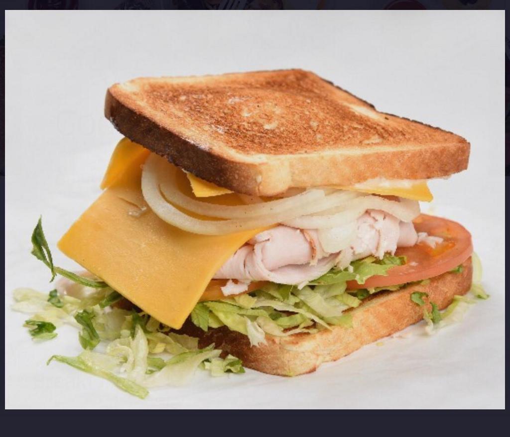 ‘ boars head  Turkey breast sandwich · Included cheese, lettuce, mayo and tomato.