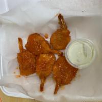 8 Pieces Buffalo Shrimps · Served with hot sauce and blue cheese.
