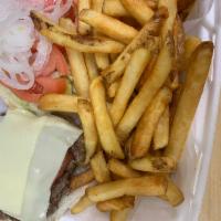 Buffalo Burger Deluxe · Served with lettuce, tomato, onion, coleslaw and french fries.