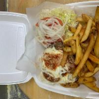 Pizza Burger Deluxe · Served with lettuce, tomato, onion, coleslaw and french fries.