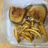 Patty Melt Deluxe · On rye with fried onions and Swiss cheese. Served with lettuce, tomato, onion, coleslaw and ...