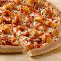 Buffalo Chicken Pizza · Chicken poppers, bacon, onion, ranch sauce and Buffalo swirl.