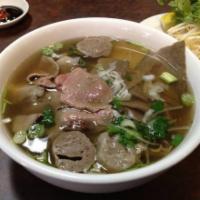 D4. Pho Tai Bo Vien · Noodle soup with eye round steak and meat ball.