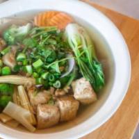 D9. Pho Chay · Vegetarian noodle soup with broccoli, carrot, bok choy, mushroom, and fried tofu.
