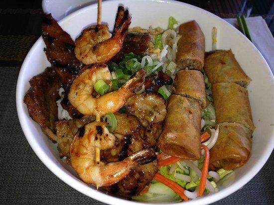 B1. Bun Tom Thit Nuong Cha Gio · Grilled shrimp, charbroiled pork, and spring rolls served with vermicelli noodle and fish sauce.