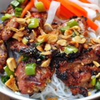 B3. Bun Thit Nuong · Grilled charbroiled pork served with vermicelli noodle and fish sauce.