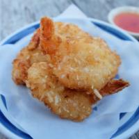 DA1. Coconut Shrimps · Fried coconut shrimps with sweet & sour sauce.