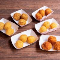 Large Kiev Bites  · 12 pieces per order. Chicken nuggets with a center full of infused butter. 