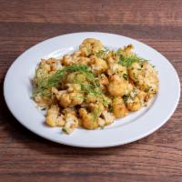Roasted Cauliflower · Roasted with our special herb blend and pumpkin seeds.

