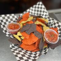  Chips and Salsa ·  Tortilla Chips w/ our own Salsa Fresca 
