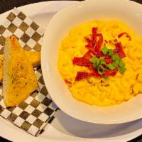 Bacon Mac & Cheese · Macaroni smothered with creamy homemade cheese sauce and bacon. Served with French bread.
