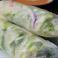 Tofu Salad Roll · 2 rolls. Tofu, Fresh vegetables wrapped with rice paper served with peanut sauce.