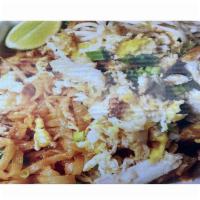 Crab Pad Thai  · Thin rice noodle with crab meat, egg, green onion, bean sprout, ground peanuts, lime.
