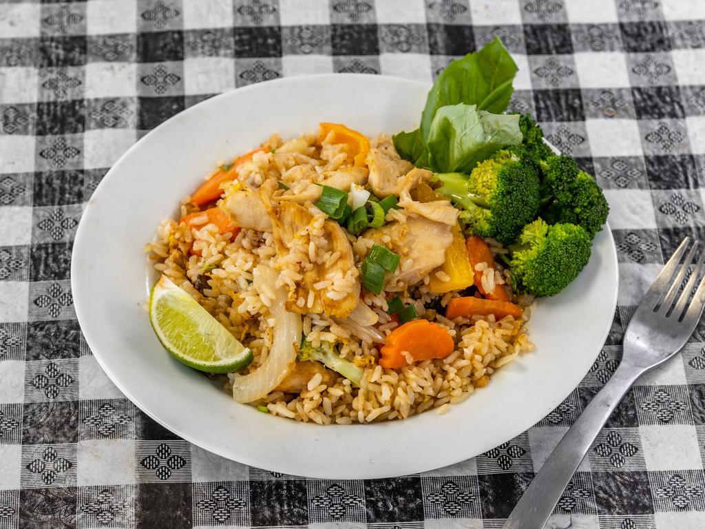 Thai Fried Rice · Fried rice with egg, onion, tomato, broccoli, pea, carrot.