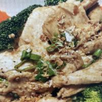 Garlic · Fresh garlic in garlic sauce and steamed broccoli, carrot, cabbage topped with green onion, ...