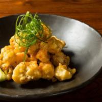 Bang-Bang Crispy Cauliflower · Tempura-fried cauliflower tossed with spicy miso mayo. Finished with togarashi ichimi, scall...