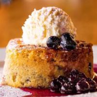Blueberry Butter Cake · Fluffy house-made blueberry butter cake is topped with plump, fresh blueberries and vanilla ...