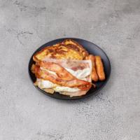 Hungry Man Breakfast · 2 pieces of French toast with ham, bacon, sausage and 2 eggs any style.