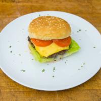 Classic Cheeseburger · Homemade 100% all beef patty with American cheese, lettuce, tomatoes, onions, mayonnaise and...