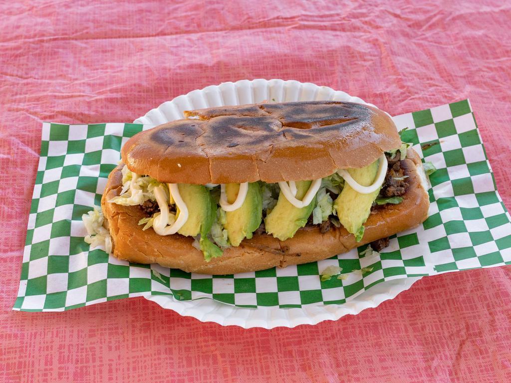Tortas · Butter toasted with choice of meat, beans, lettuce, avocado, tomato & mayo.