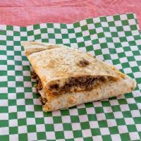 Quesadillla · Flour tortilla with choice of meat, cheese & sour cream.