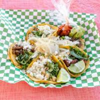 Street Tacos · Meat, queso fresco, cilantro, grilled onions.