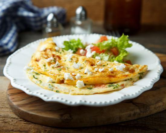 The Greek Omelet · Feta cheese, tomatoes and onions.