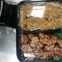 C6. Sesame Chicken Combo  · Served with fried rice and egg roll.