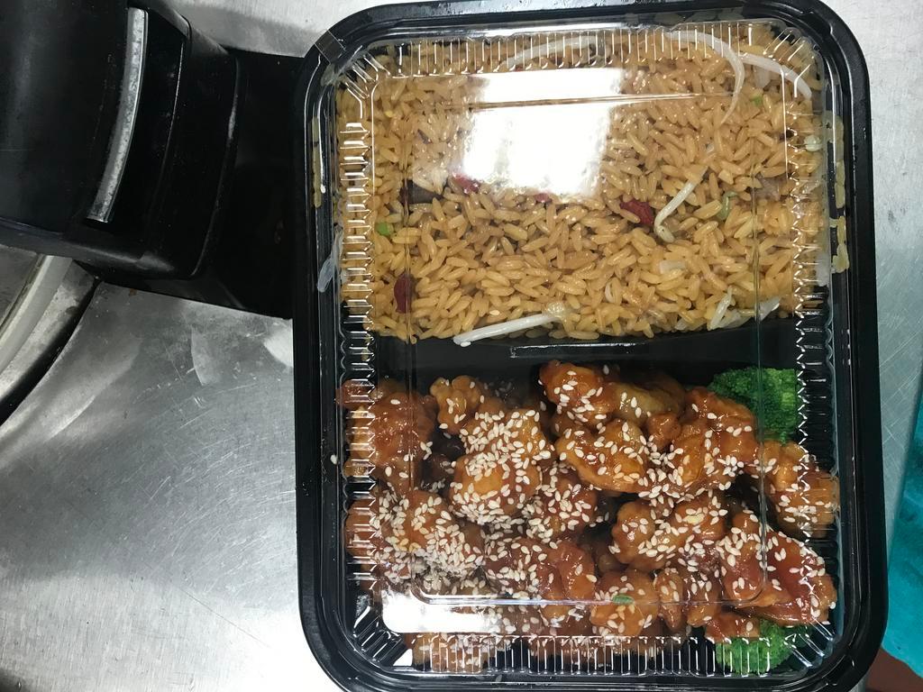 C6. Sesame Chicken Combo  · Served with fried rice and egg roll.