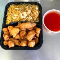 C7. Sweet Sour Chicken Combo  · Served with fried rice and egg roll.