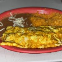 Fajita Omelet · 3 eggs filled with grilled onions and peppers, cheese and option of grilled chicken, steak o...