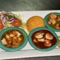 Camarones 3 Islas · Shrimps cooked in green sauce, al mojo del ajo, a la diabla sauce served with rice and salad 