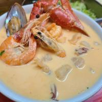 Caldo de Mariscos con Coco · Special soup with fish fillet, scallops, mussels, shrimps, snow crab, octopus, coconut cream...