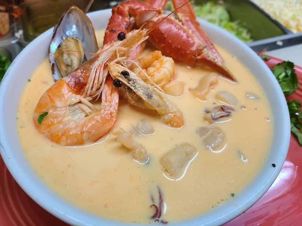 Caldo de Mariscos con Coco · Special soup with fish fillet, scallops, mussels, shrimps, snow crab, octopus, coconut cream served with rice 