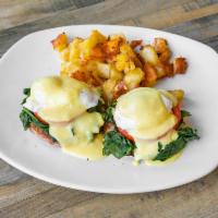 Eggs Benedict Breakfast · 2 poached eggs on a toasted English muffin with Canadian bacon and hollandaise sauce.
