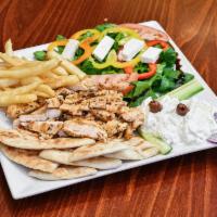 Gyro Deluxe · Served with French fries and Greek salad.