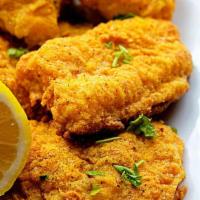 FRIED CATFISH · Southern style catfish fried to a golden brown made fresh to order served with homemade tart...