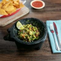 Guacamole Mexicana · Ripe avocados, tomatoes, onions, cilantro and jalapenos with just a hint of lime. Made to yo...