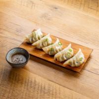 Chicken & Cabbage Dumplings · Chicken dumplings (5pcs).
Served with sweet soy dipping sauce.
Contains: Gluten, Soy
