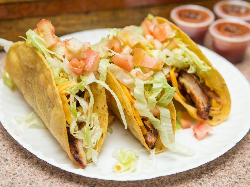 T5. Chicken Hard Taco · Served with iceberg lettuce, tomato and topped with cheddar cheese.  