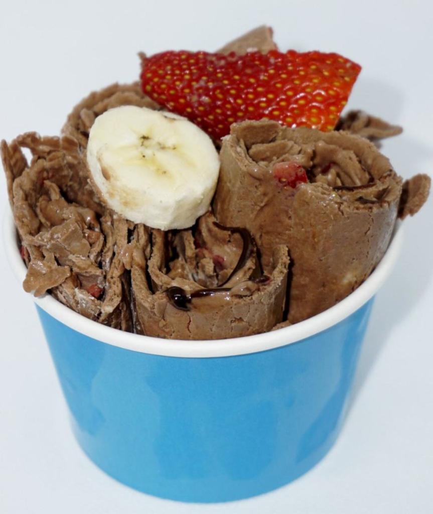 Banana Split Ice Cream · Chocolate, bananas, strawberries, and chocolate drizzle.