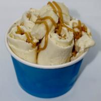 Sticky Monkey Ice Cream · Vanilla ice cream, bananas, peanut butter, and honey.