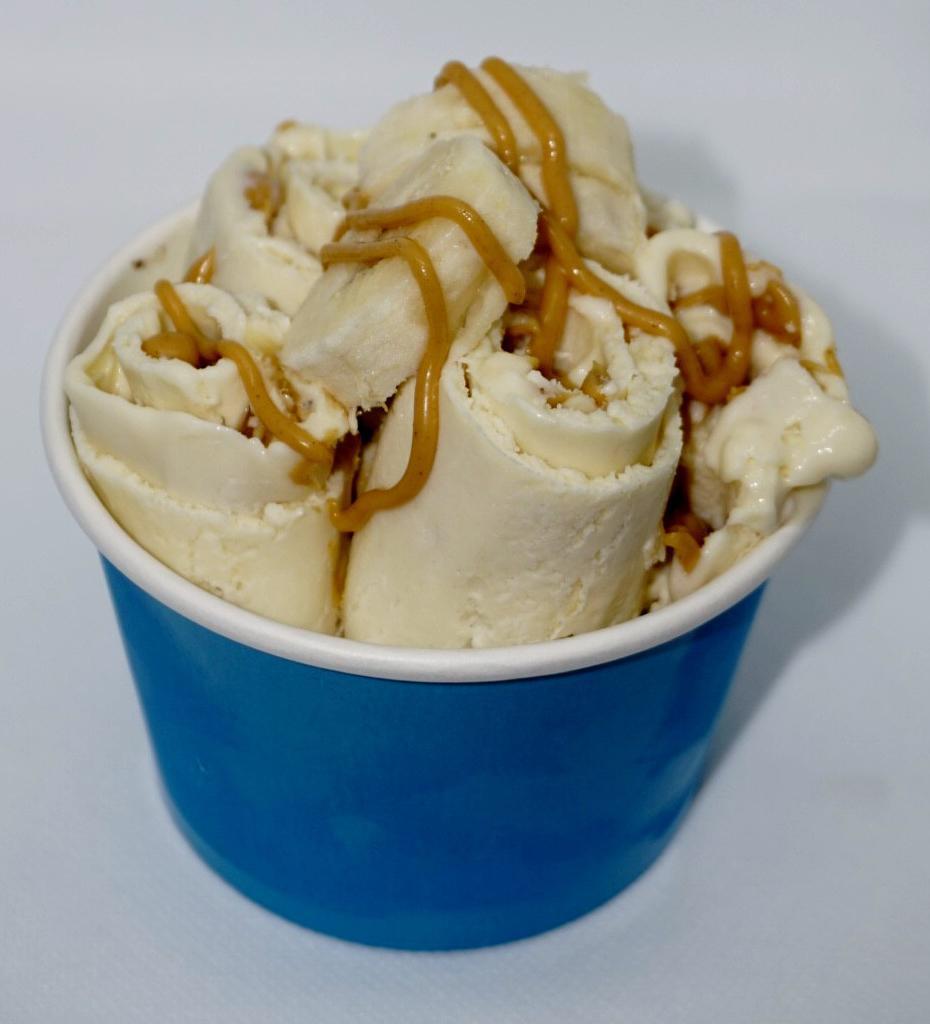 Sticky Monkey Ice Cream · Vanilla ice cream, bananas, peanut butter, and honey.