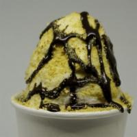 S'mores Shaved Ice · Silver fox shaved ice, a scoop of vanilla ice cream, topped with marshmallow cream, chocolat...
