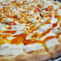 Our Famous Eagles Pizza · Denotes favorite. A white pizza base with breaded chicken, ranch dressing, mild wing sauce a...