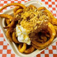 Special Fries · Curly potato fries, seasoned with our special homemade seasoning, topped with out home made ...