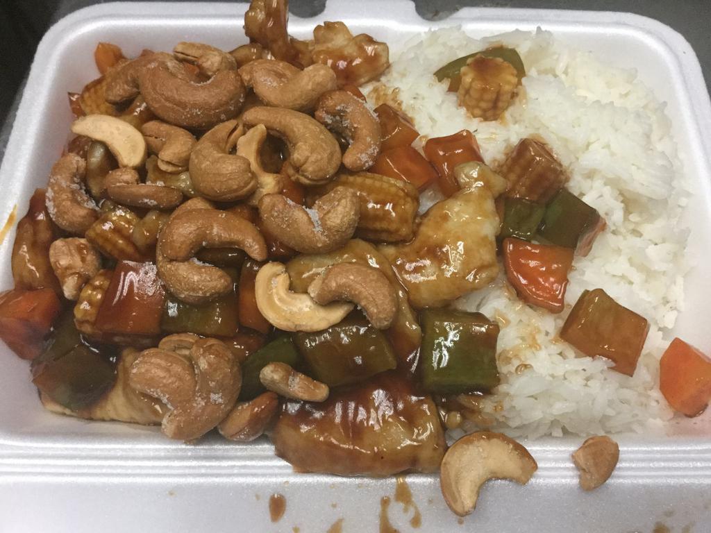 68. Chicken with Cashew Nuts · Served with white rice.